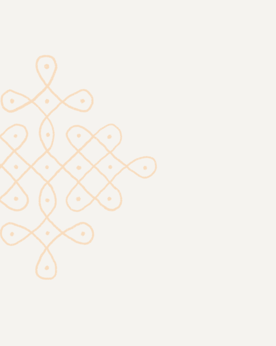 Decorative pattern in gold on a light beige background