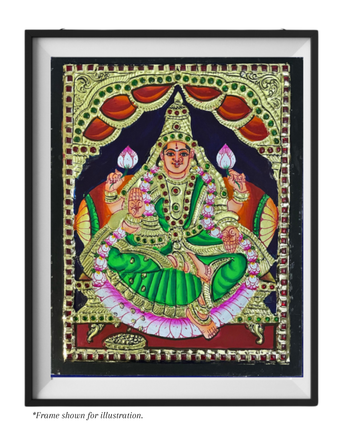 A Tanjore painting of the goddess Gajalakshmi seated on a lotus, flanked by elephants, with a richly detailed, colorful background and gold accents.